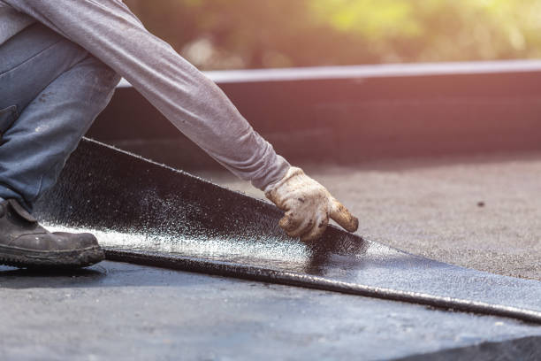 Professional Basement Waterproofing technician working in Waconia, MN